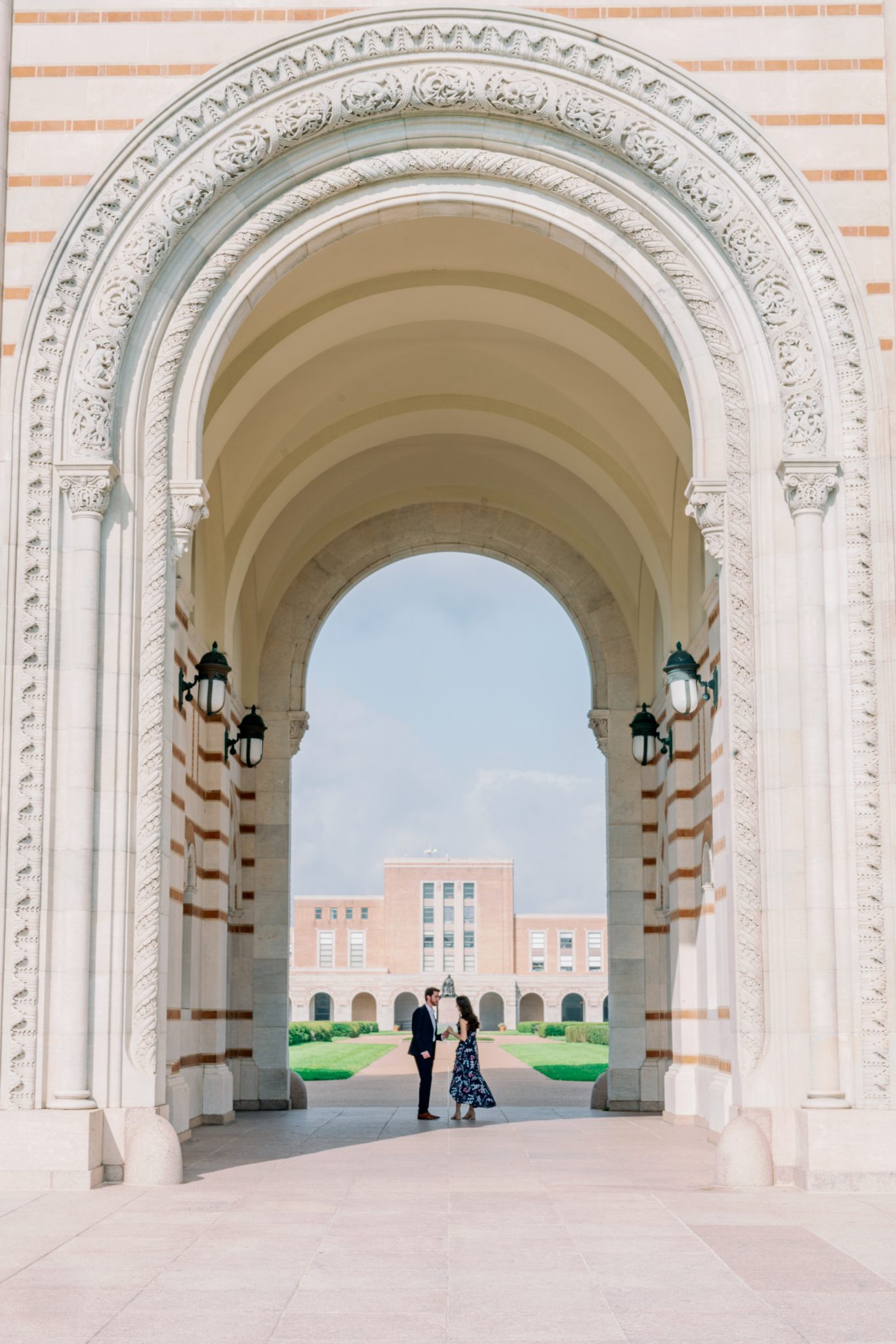 Couple underneath arch, shot by Rachel J Hahn Photography
